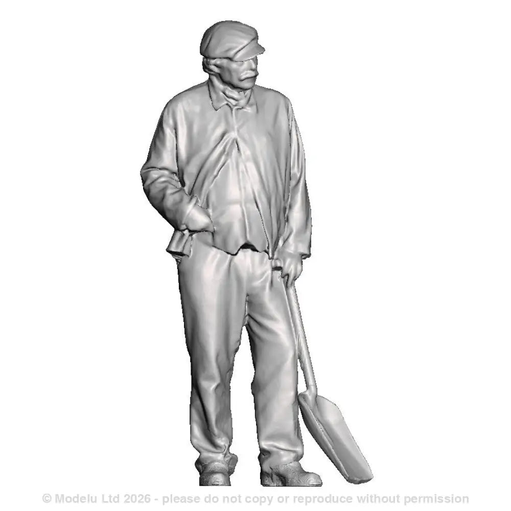 A fireman with firing shovel