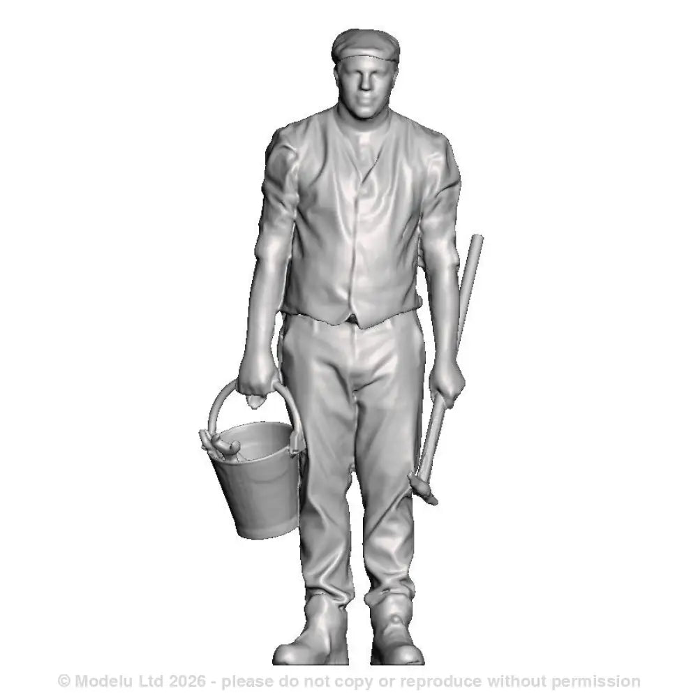 A loco crew man with bucket and coal pick