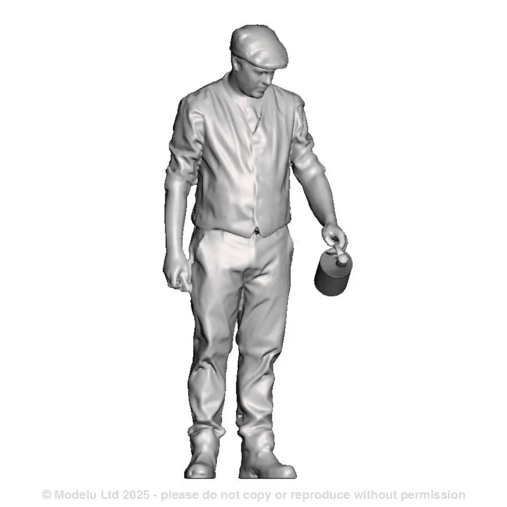 A loco crew man pouring an oil can