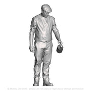 A loco crew man pouring an oil can