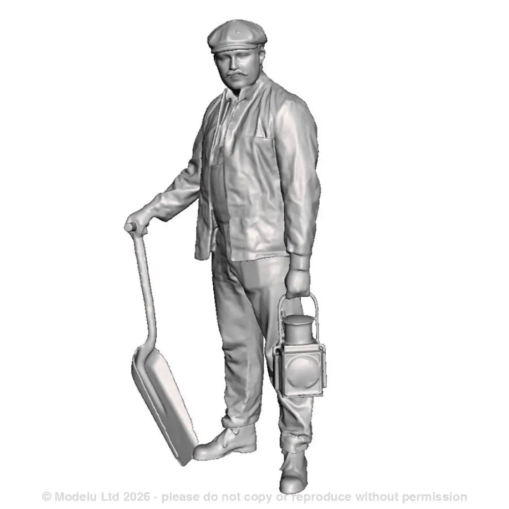 A GWR fireman with firing shovel and GWR loco head lamp