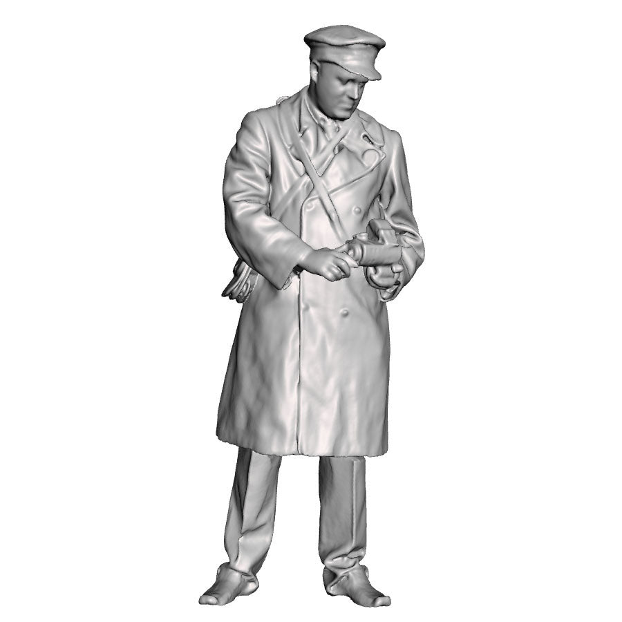 A conductor in winter coat