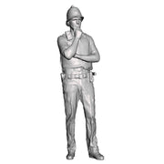 A policeman at ease wearing custodian helmet
