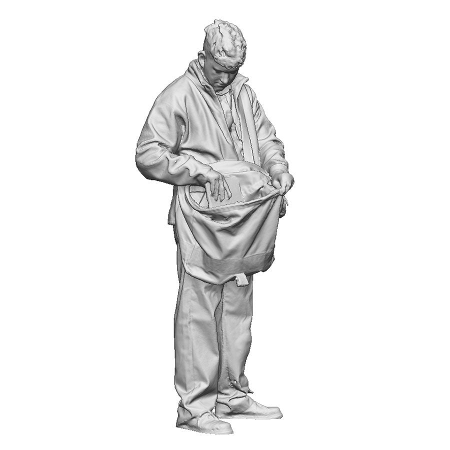 A postman checking his post bag