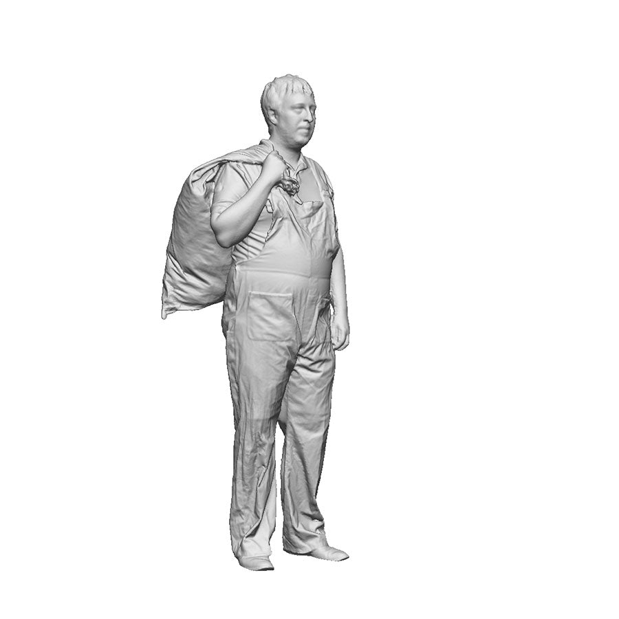 A Royal Mail worker carrying a mail bag