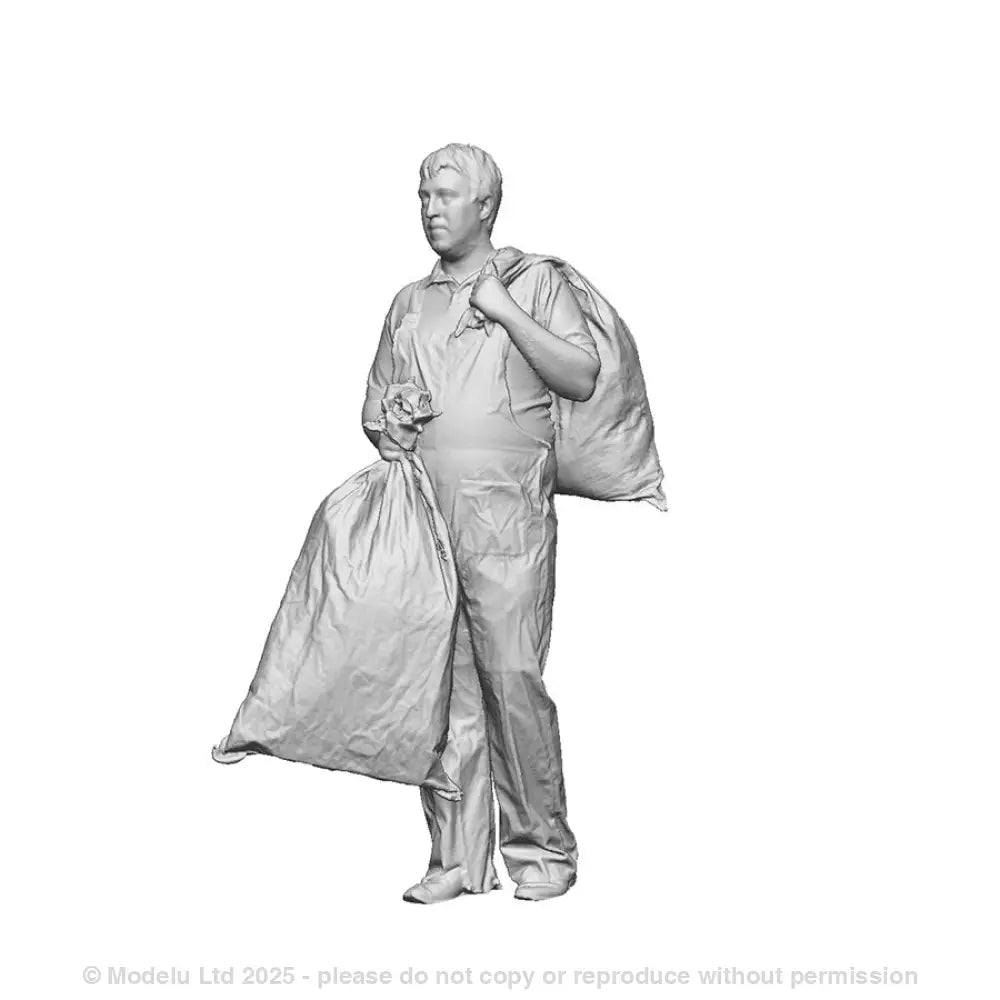 A Royal Mail worker carrying a mail bag