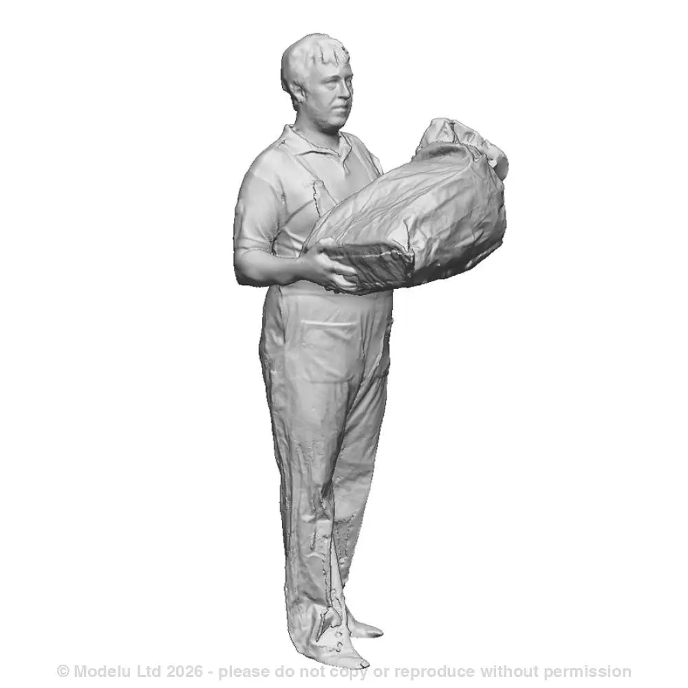 A Royal Mail worker handling a mail bag