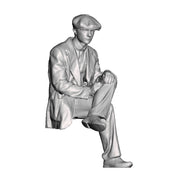 A workman seated