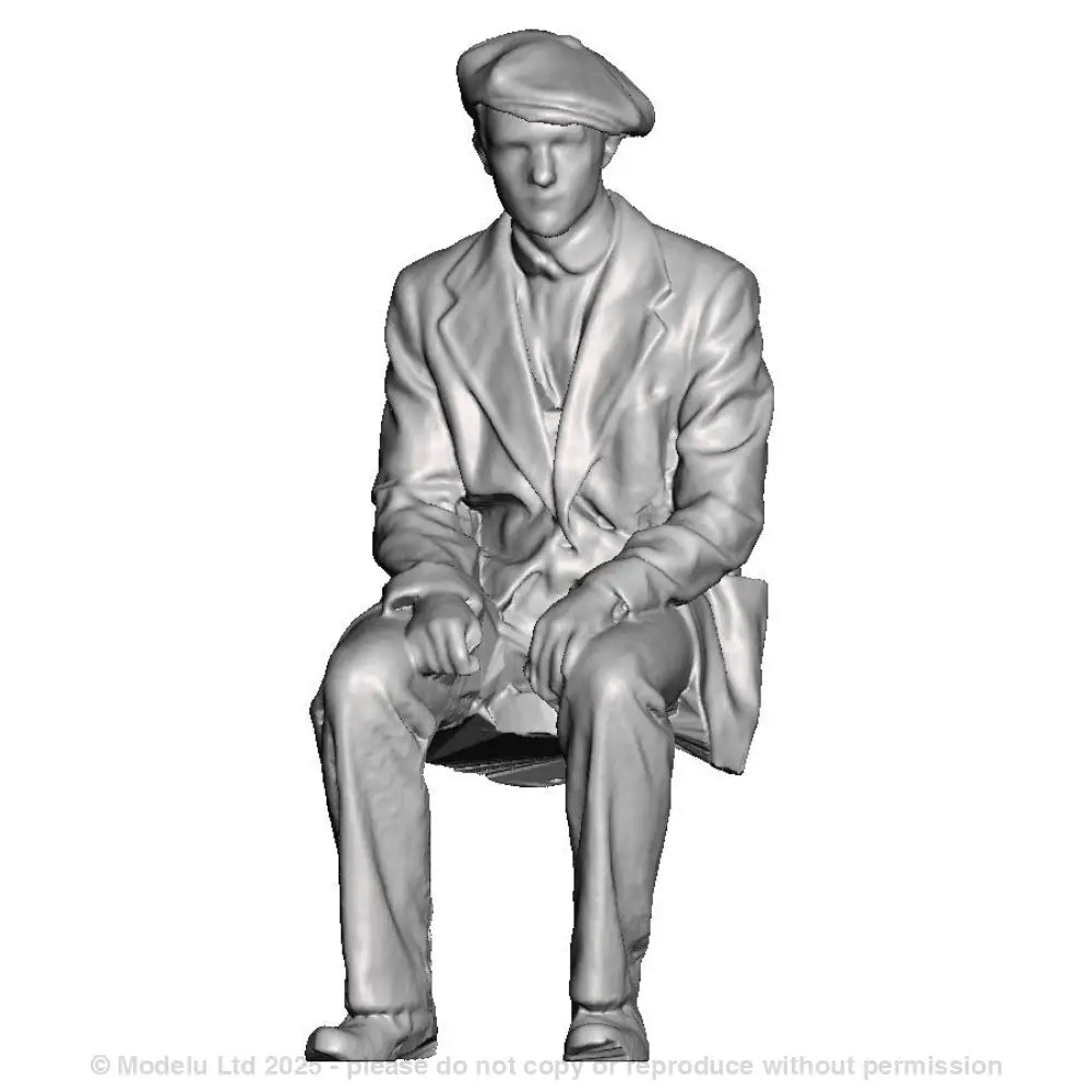 A workman seated