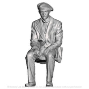 A workman seated
