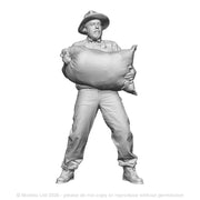 A mill worker lifting a sack