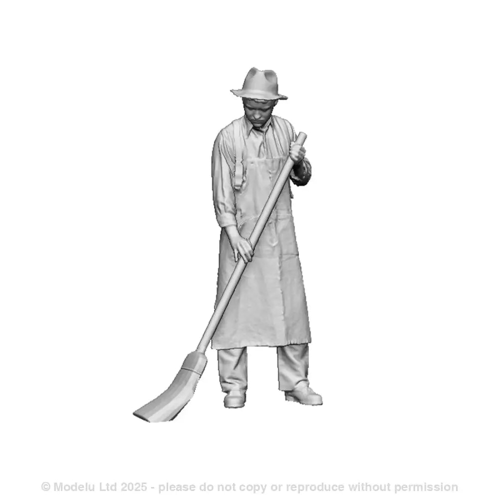 A mill worker sweeping