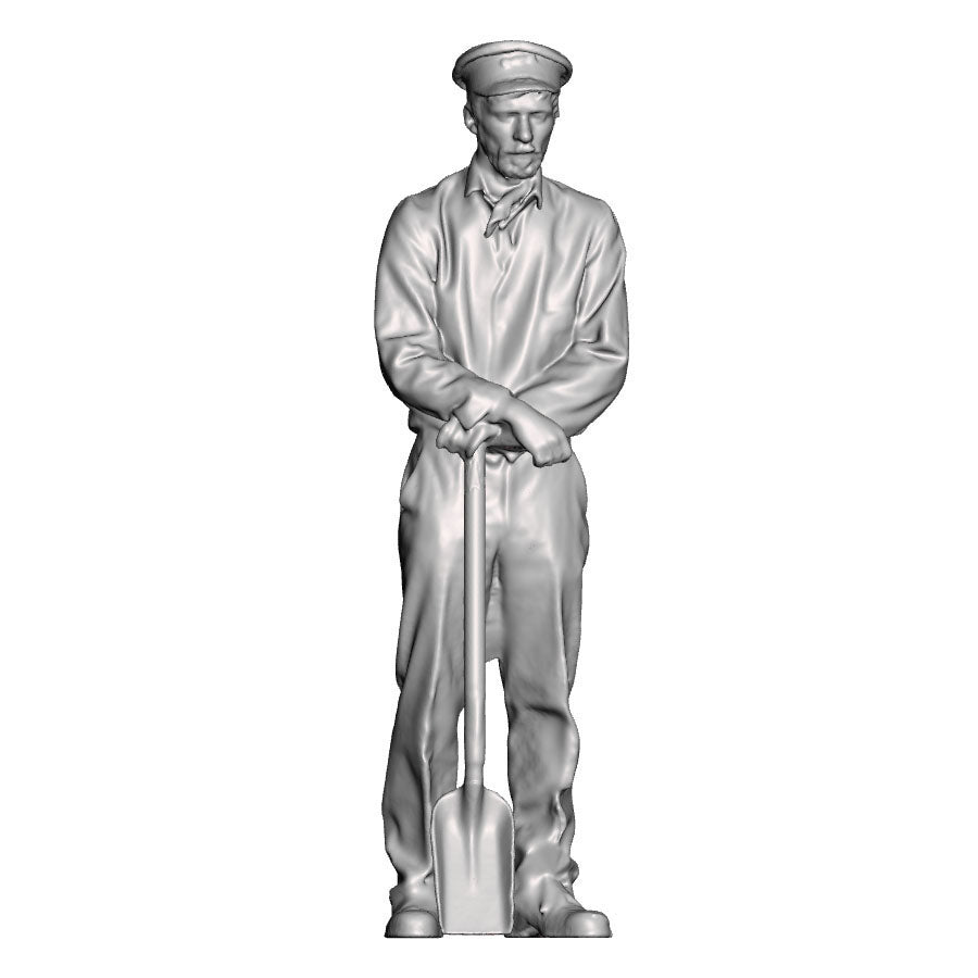 A fireman with firing shovel