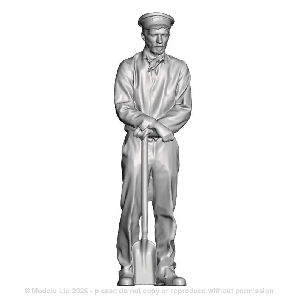 A fireman with firing shovel