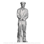 A fireman with firing shovel