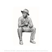 A mill worker at rest