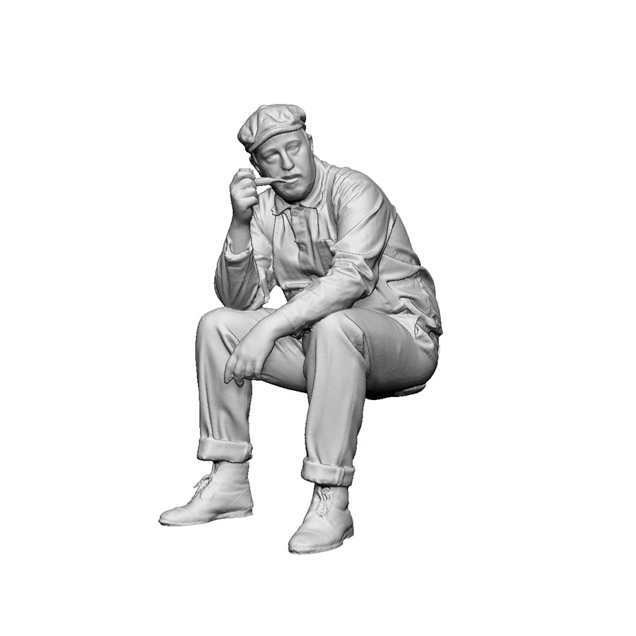 A mill worker at rest