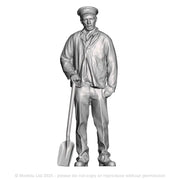 A fireman with firing shovel