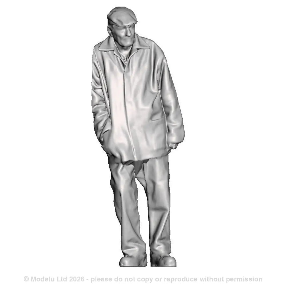 A workman in donkey jacket leaning