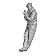 A workman leaning eating a sandwich