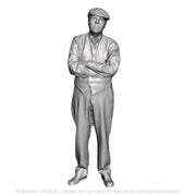 A workman with arms crossed