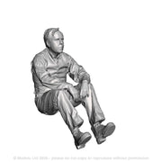 A workman seated