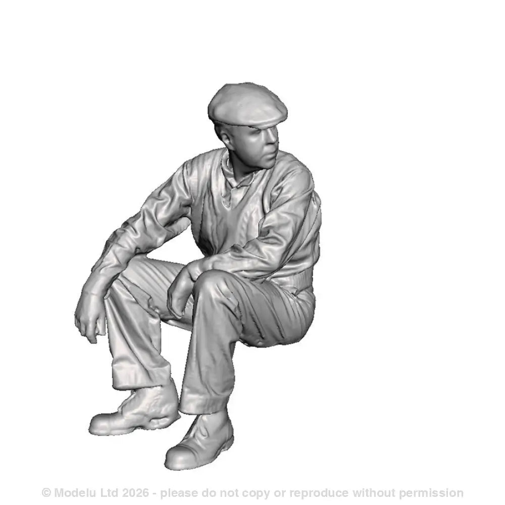 A workman seated
