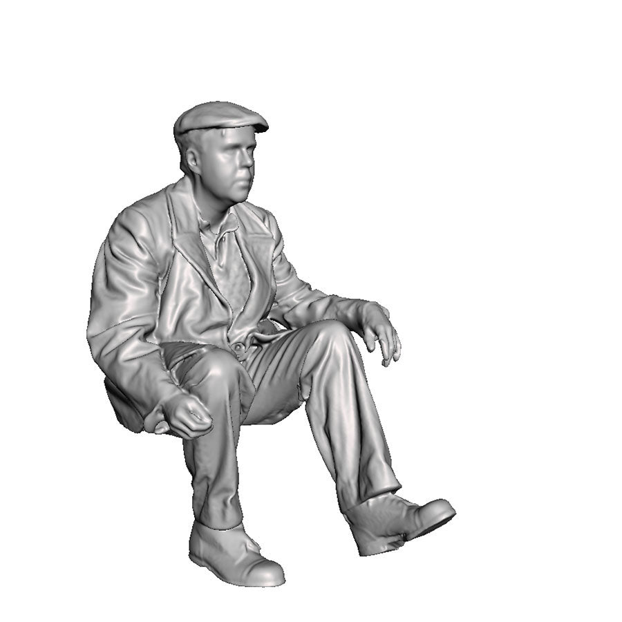 A workman seated
