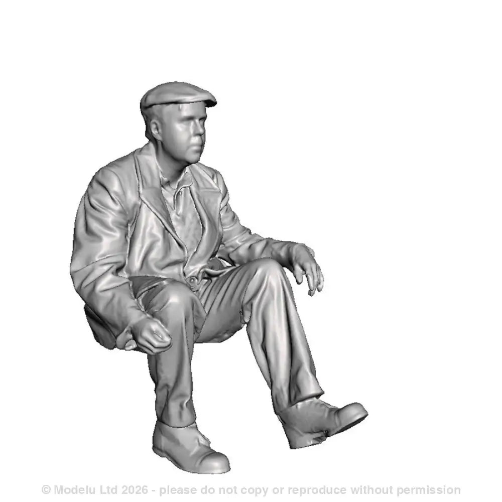 A workman seated