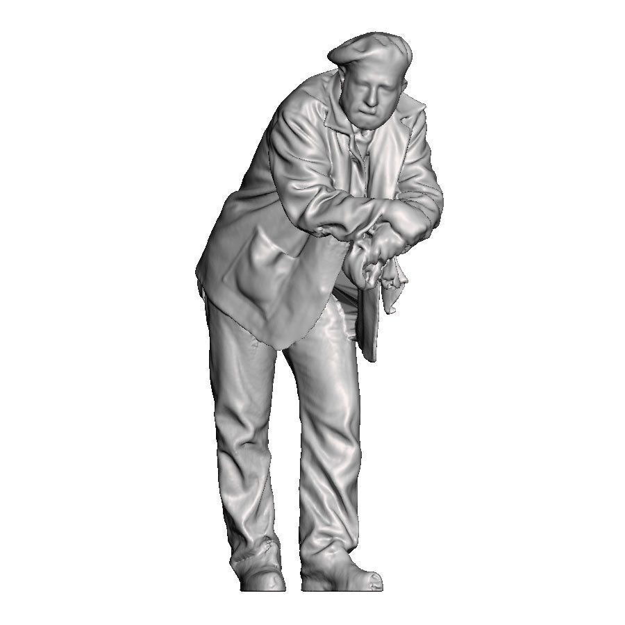 A loco crew man wearing berret leaning