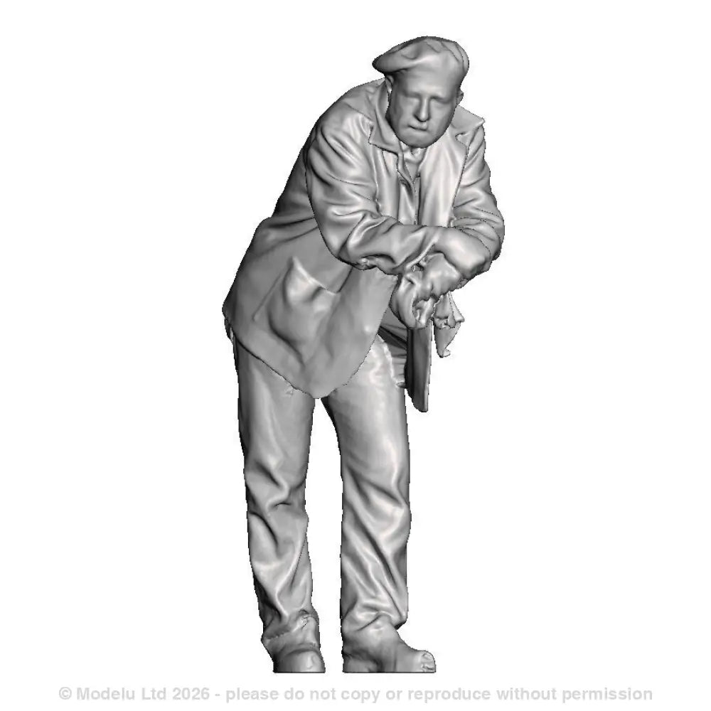 A loco crew man wearing berret leaning