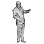 A loco driver wearing donkey jacket operating a regulator