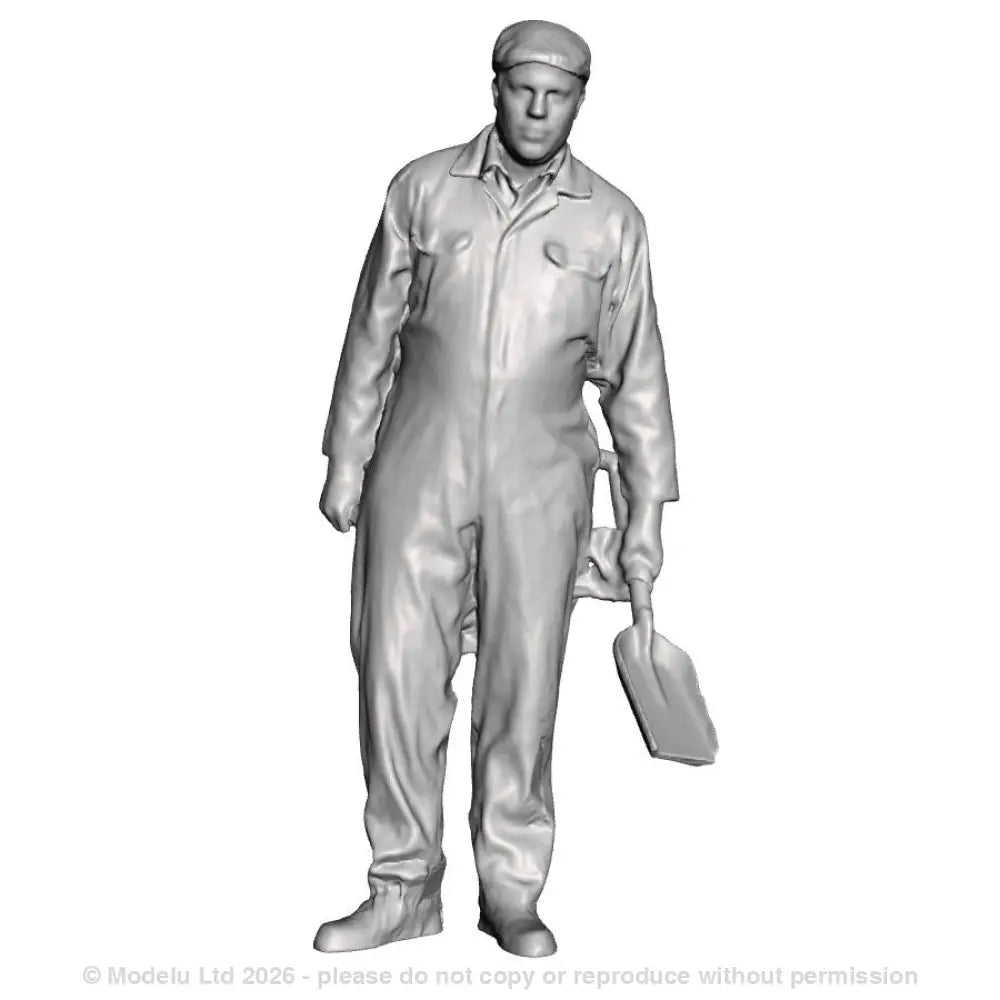 A fireman with firing shovel