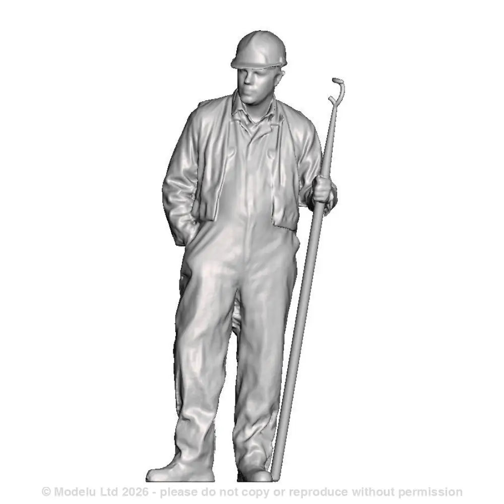 A shunter wearing a hard hat with shunters pole