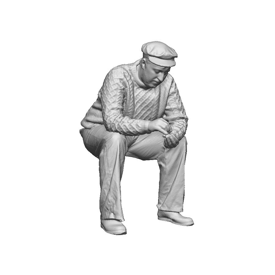 Seated crew rolling cigarette