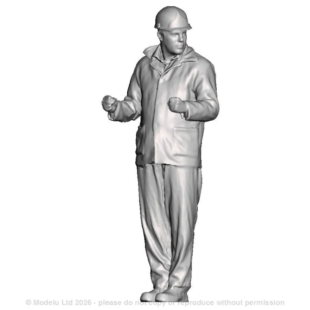 A shunter wearing a hard hat on steps