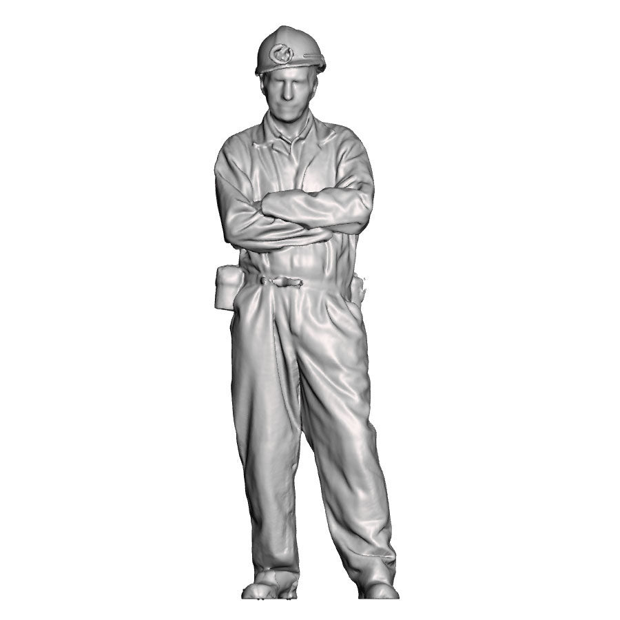 A miner with arms crossed