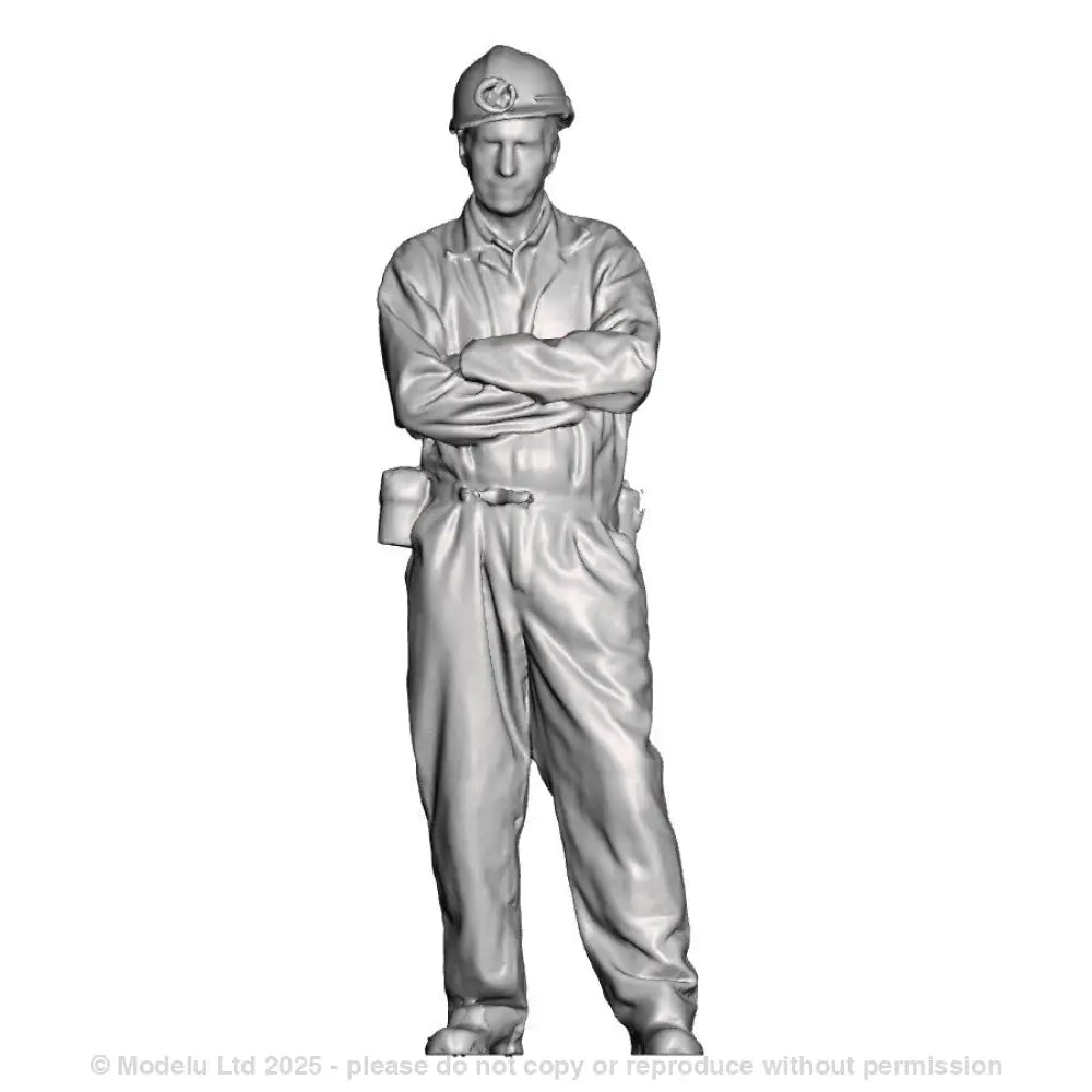 A miner with arms crossed