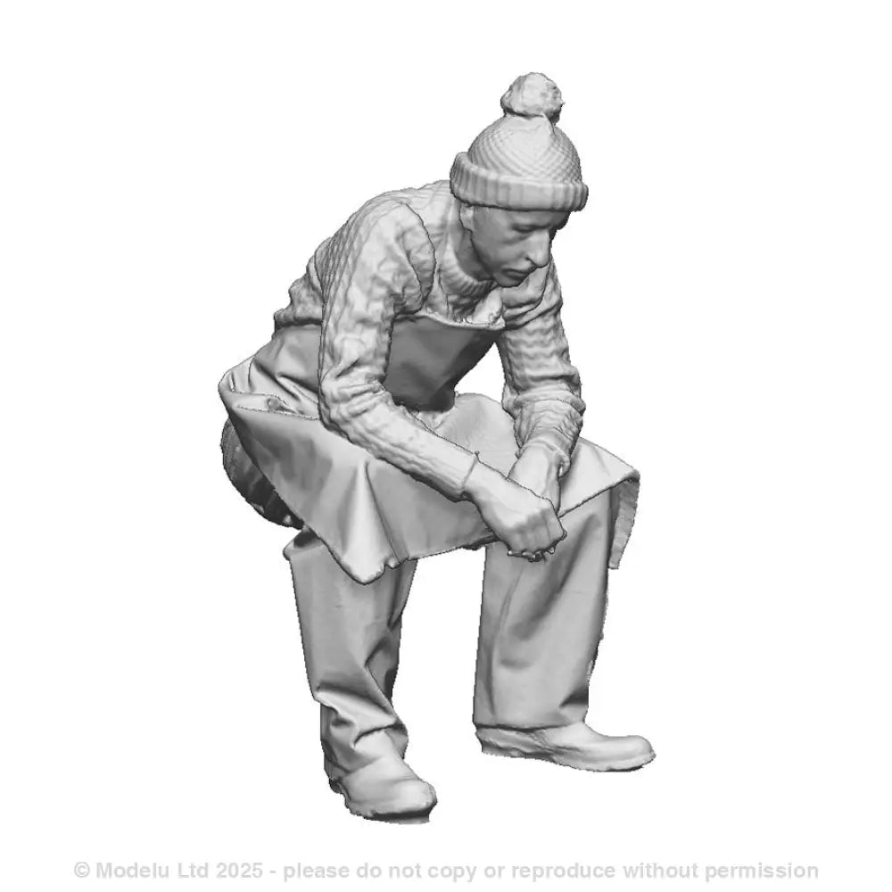 A seated fisherman in apron