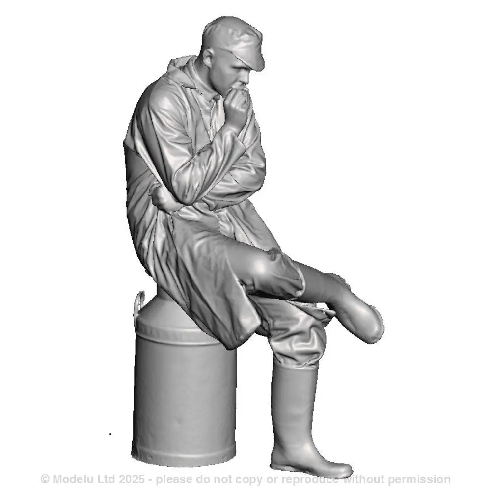 A creamery worker sat on a milk churn smoking