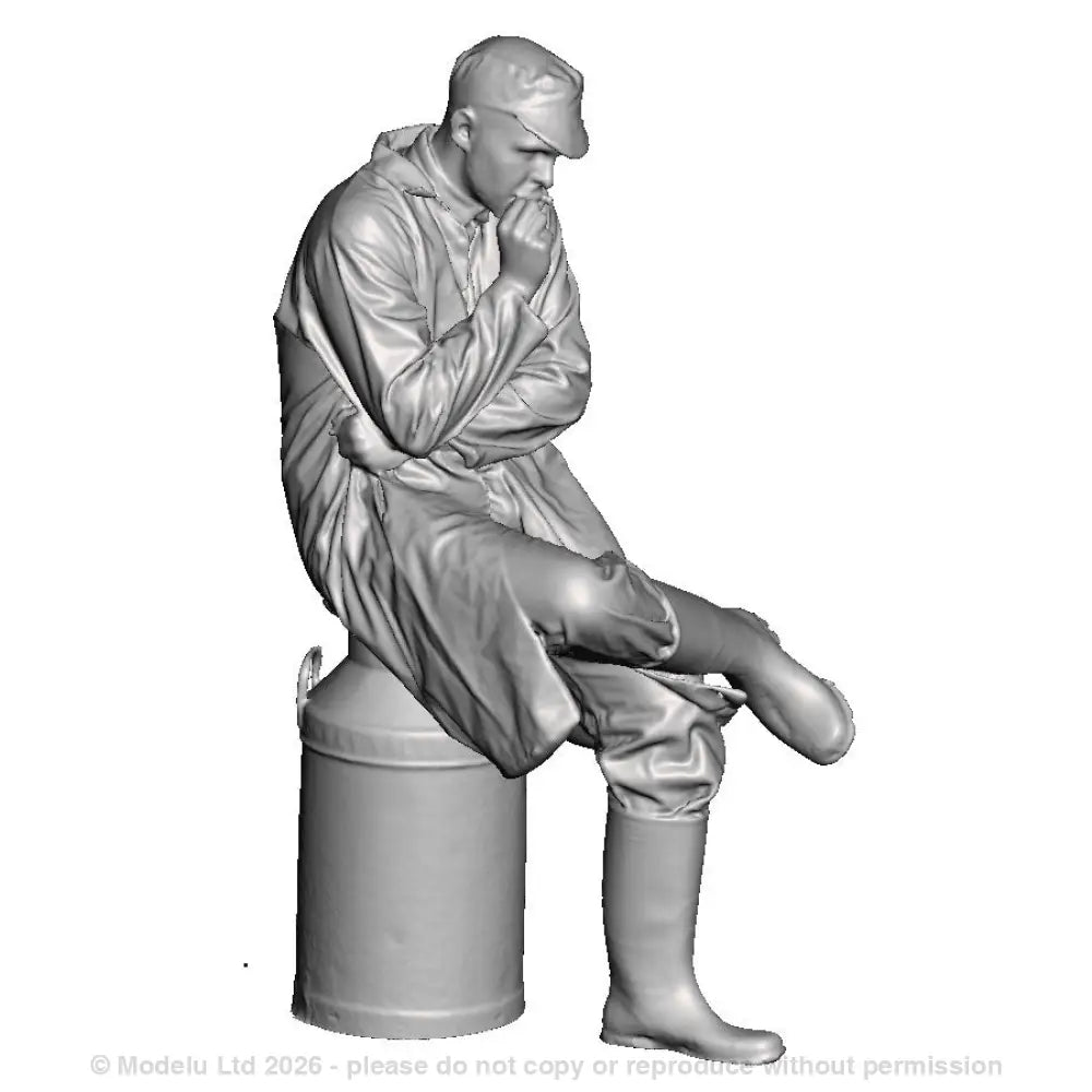 A creamery worker sat on a milk churn smoking