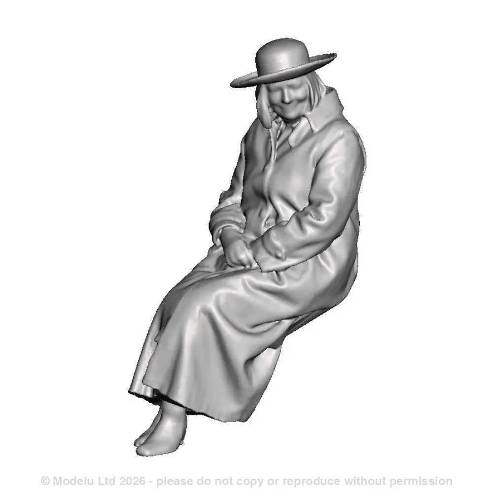 A female figure seated