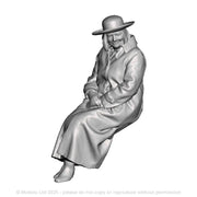 A female figure seated