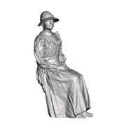 A female figure seated
