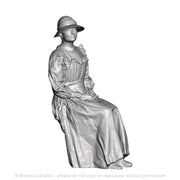 A female figure seated