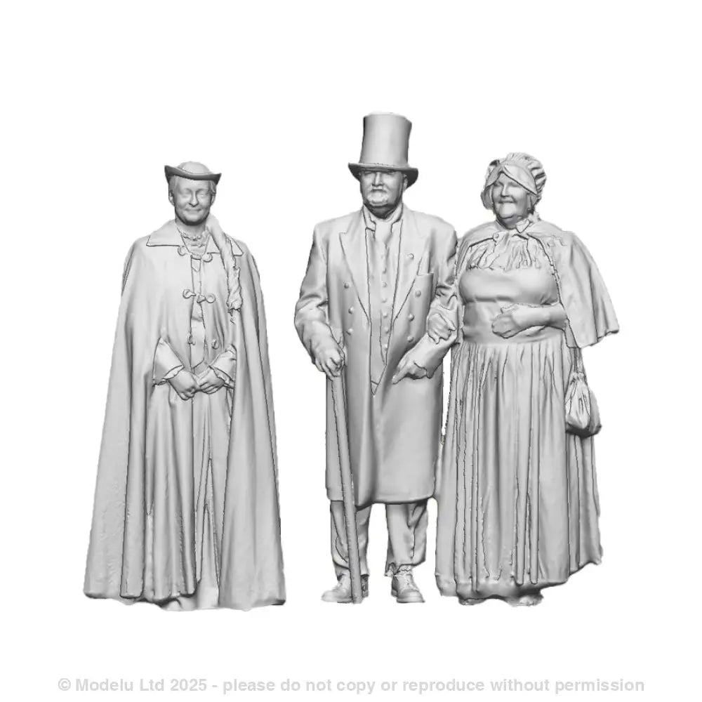A set of 3 Victorian people including one male figure with top hat and two female figures