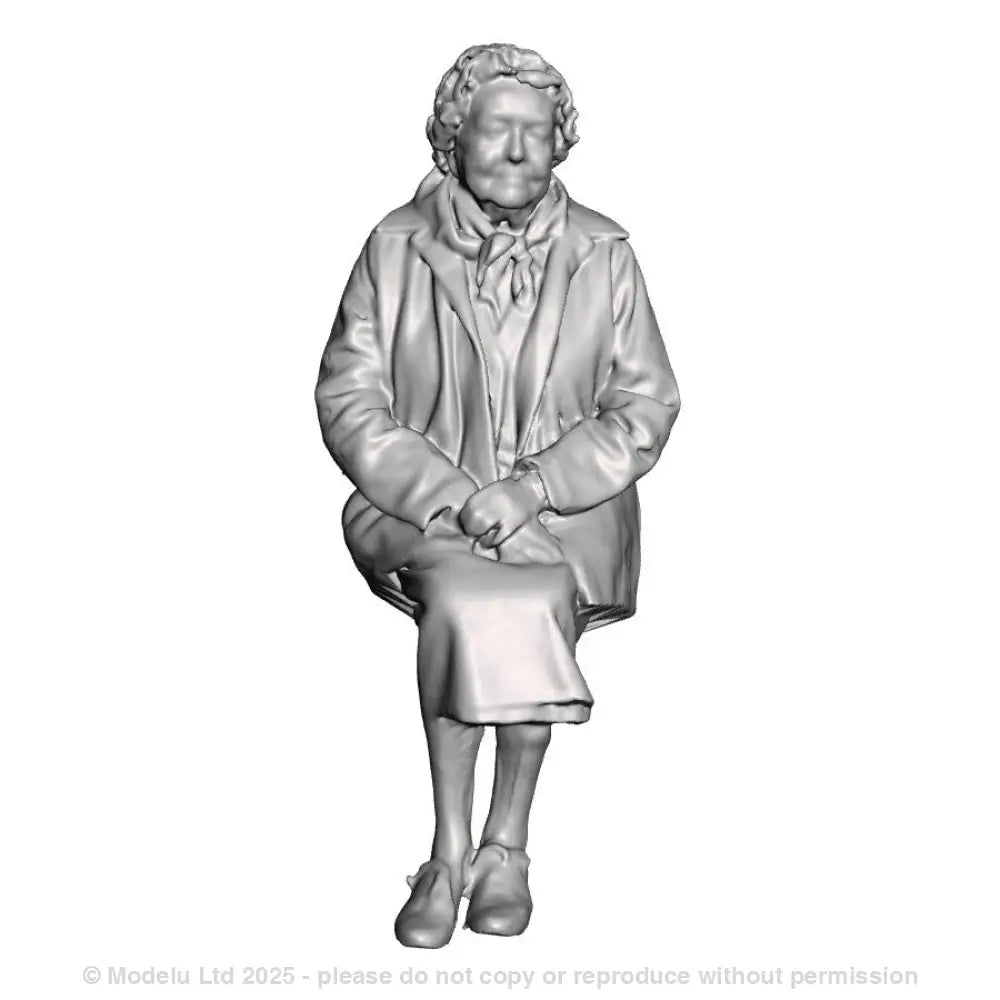 A female figure seated