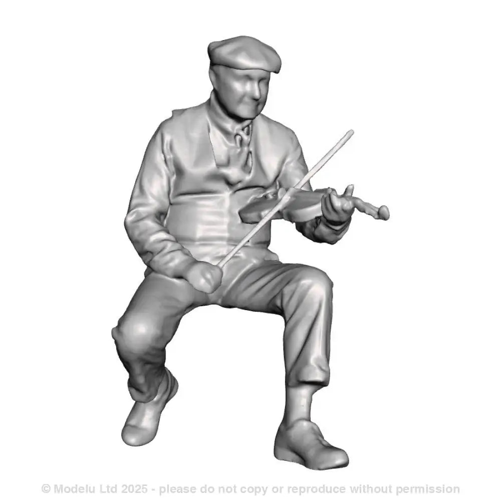 A male fiddle player seated