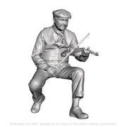 A male fiddle player seated