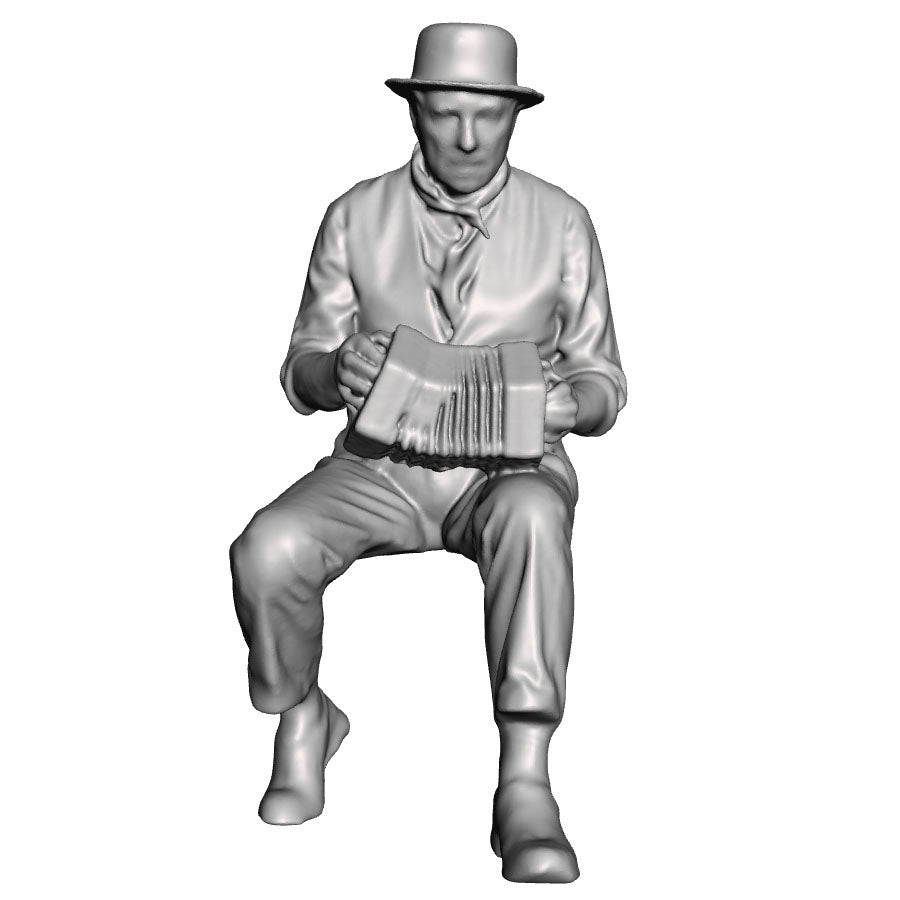 A male concertina player seated